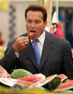 Arnold Scwarzenegger eating watermelon in Mexico